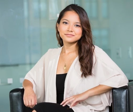 Inndira AI Assistant - Professional woman with warm smile